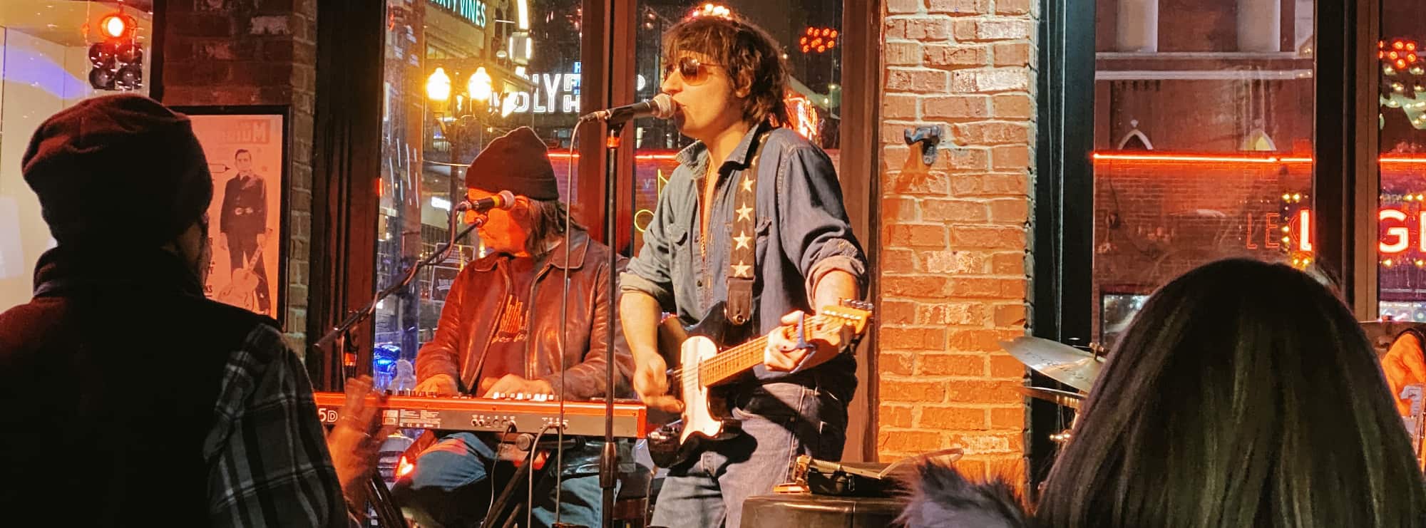 bar singer on guitar in San Diego